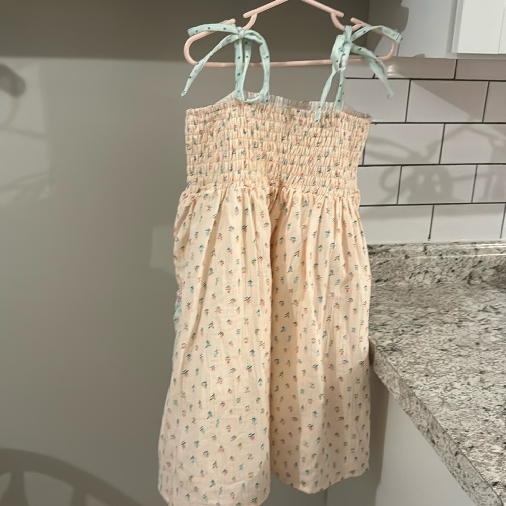 Sweet Honey smocked beach tunic, like new, size 12,have matching sister set